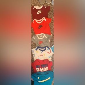 6 Nike onesies worn once…newborn